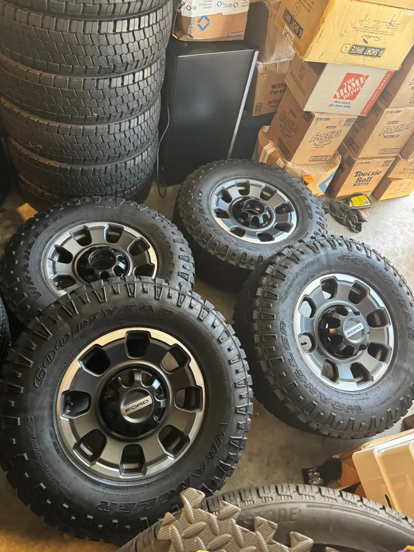 Ford all-terrain set wheels and tires at Dfw Takeoffs
