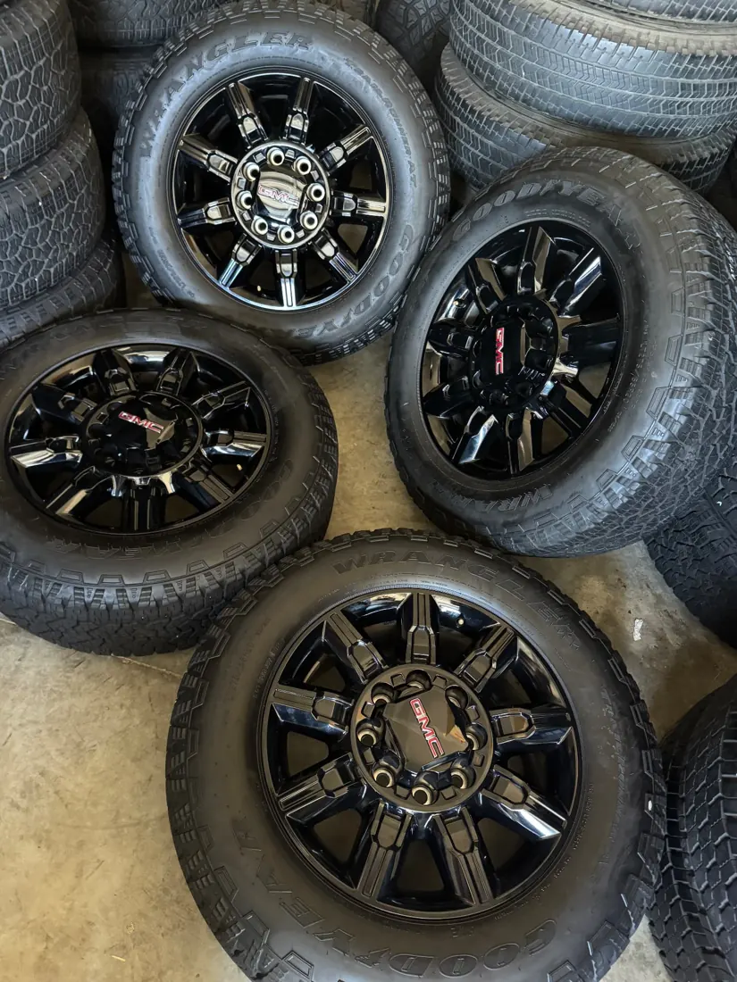 GMC AT4 8-lug black wheels and tires at Dfw Takeoffs
